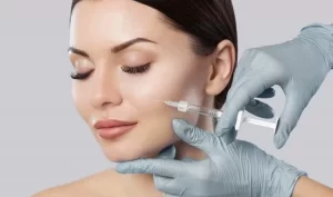 woman is getting filler injections.
